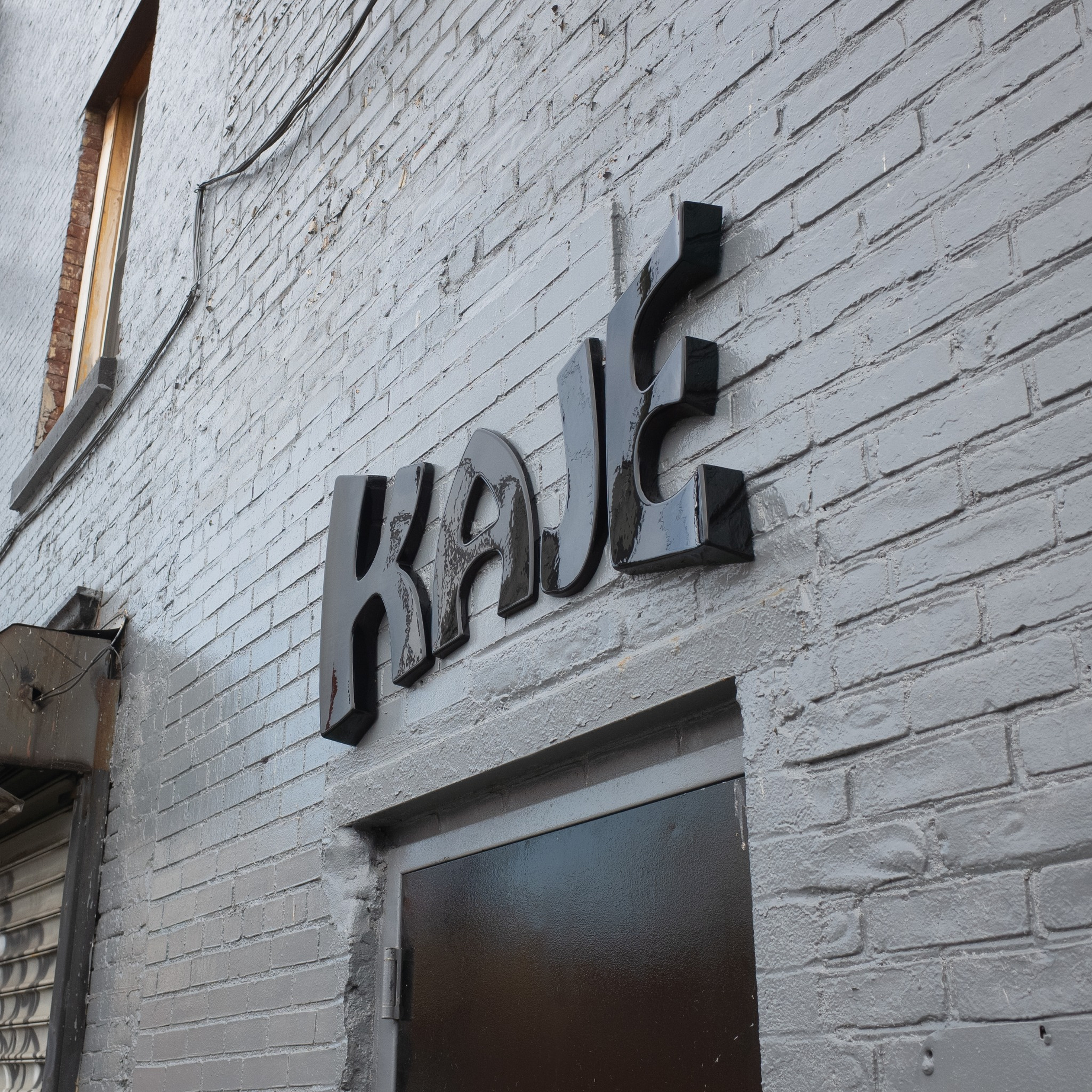 other_means_kaje_sign.png